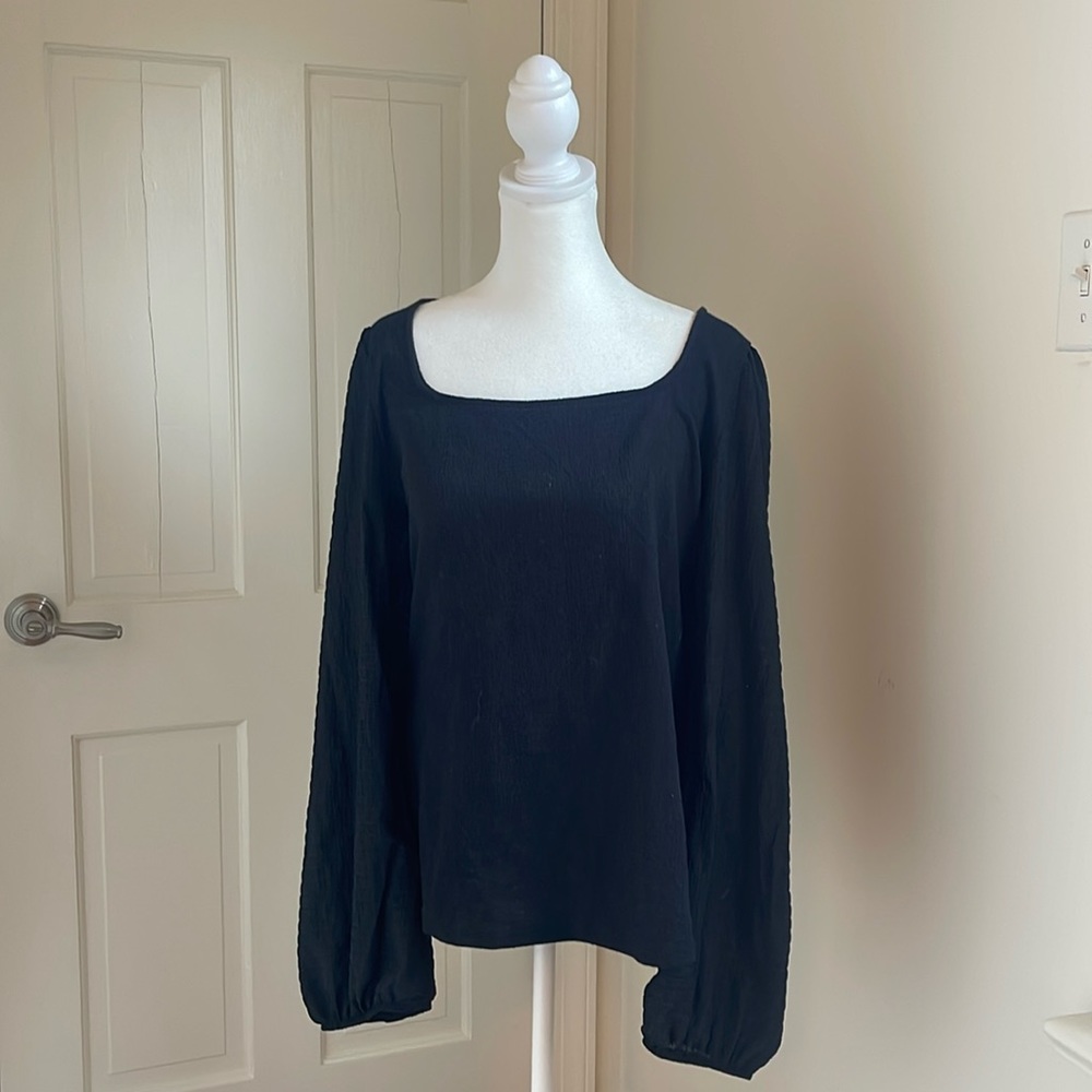 Elegant, flowy black top by Ava & Viv